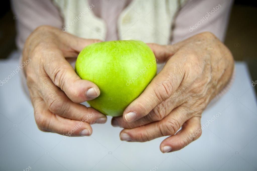 arthritis, hands holding fruit