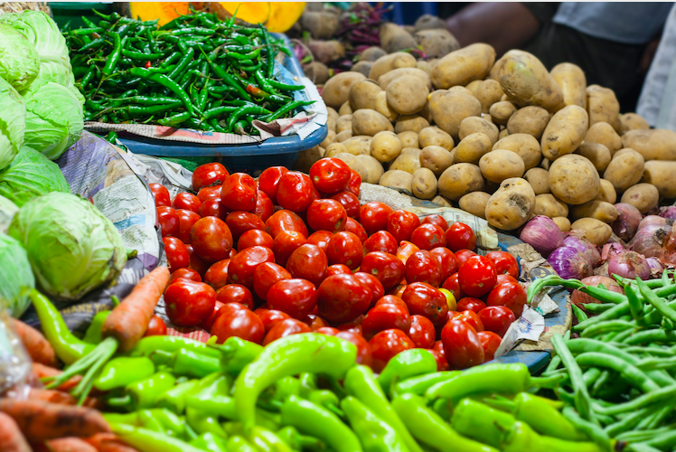 Tomatoes, green beans, and potatoes in the market