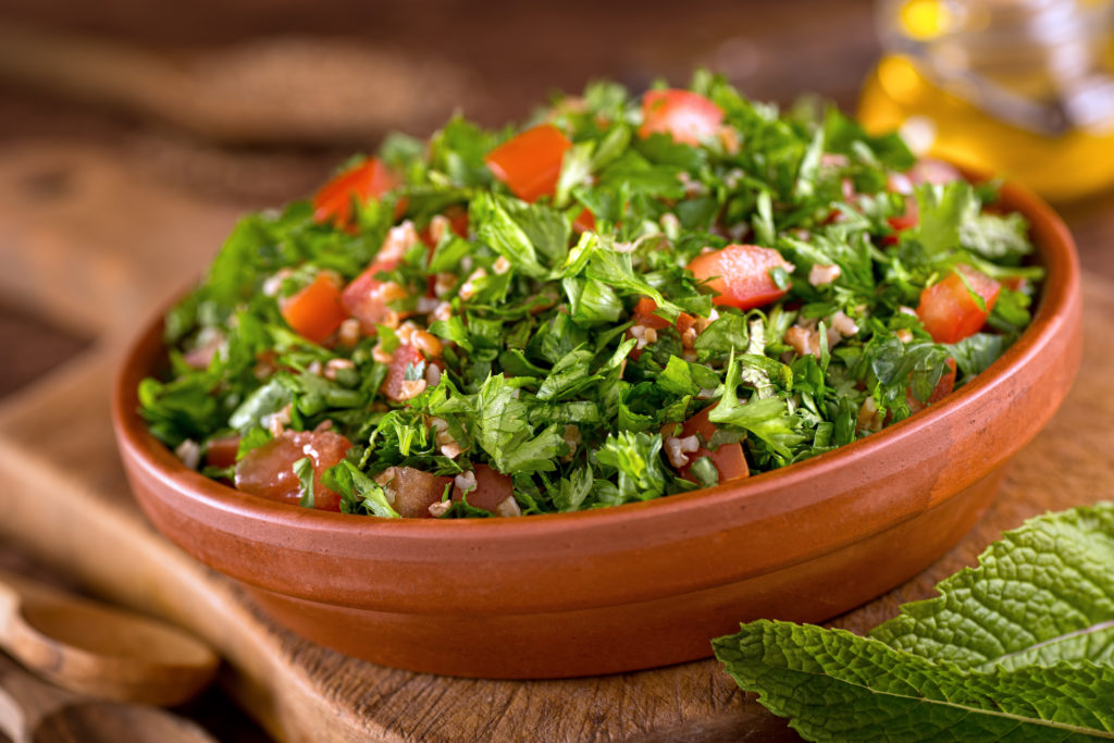 tabouli salad in terracotta bowl