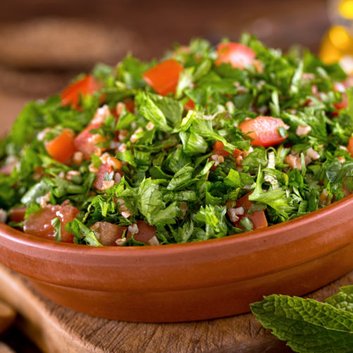 tabouli salad in terracotta bowl