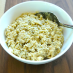 picture of quinoa risotto in a bowl with a spoon